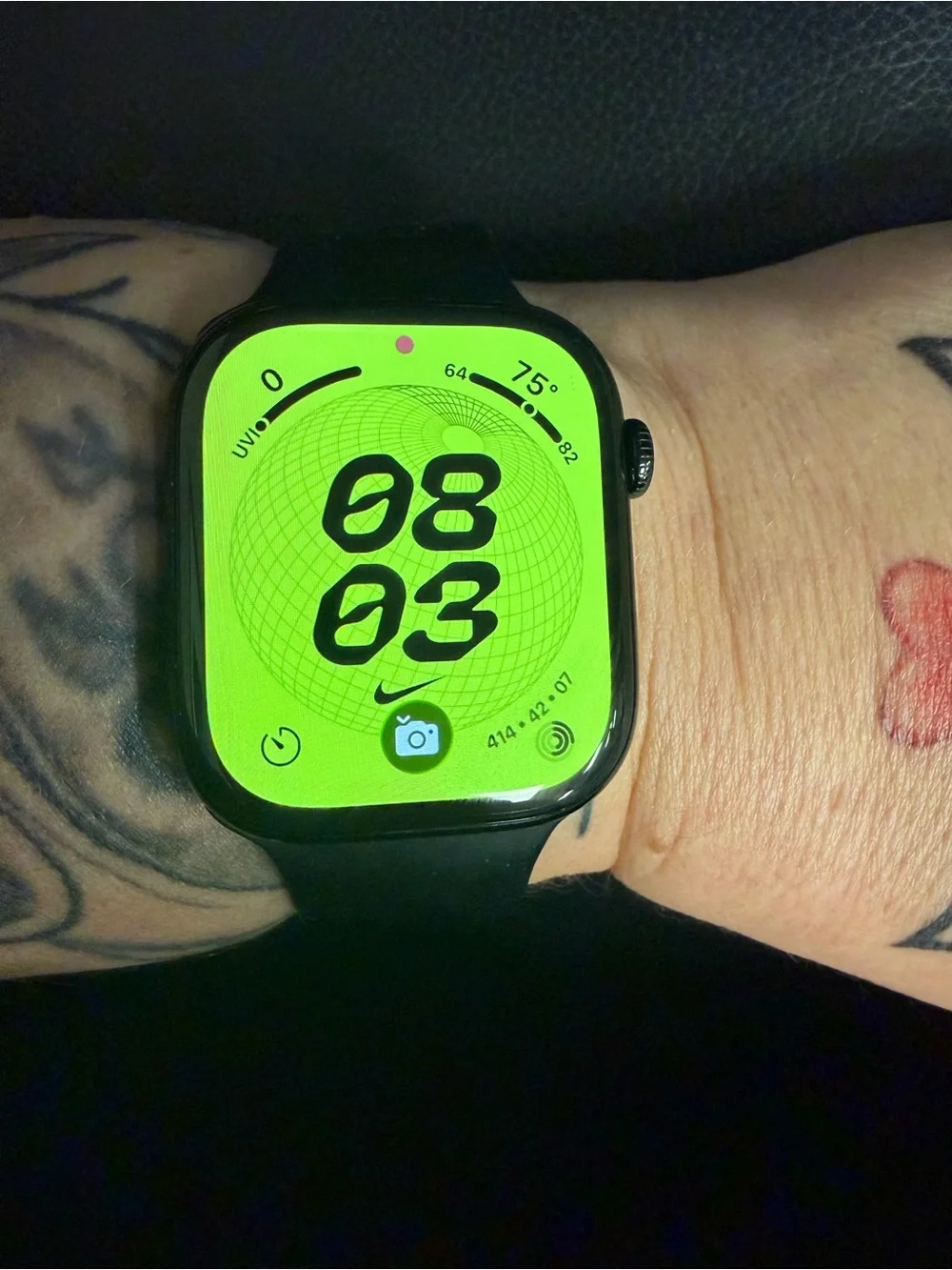 Apple Smartwatch with Black Band and Lime Green Display